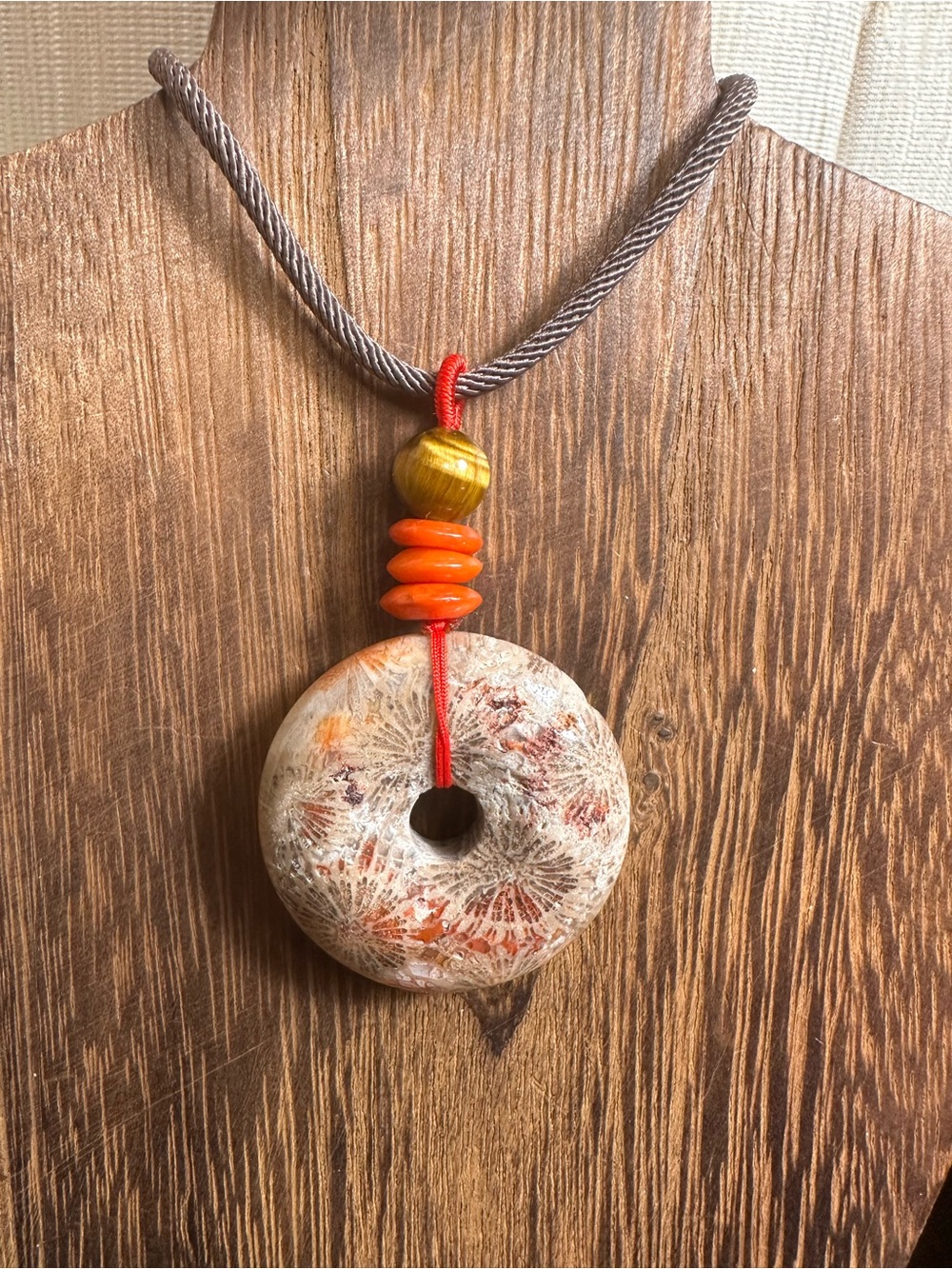 Handcrafted Red and Brown Coral Fossil Donut Pendant Necklace on Brown Rope - Picture 4 of 16